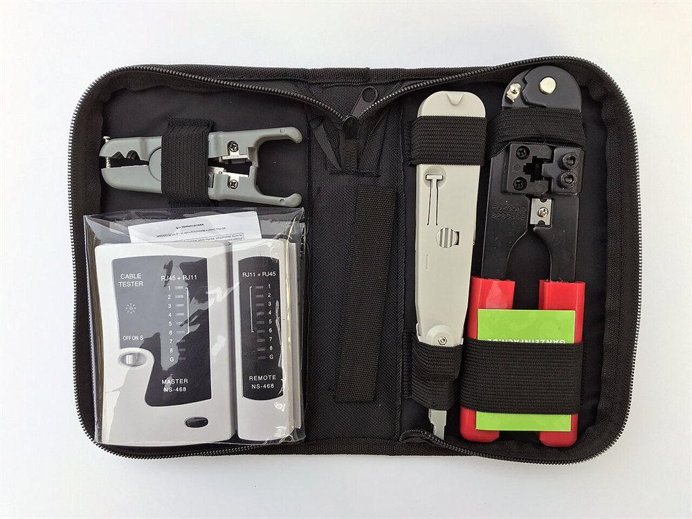 Network termination tool kit with stripper, tester and punch-down tool